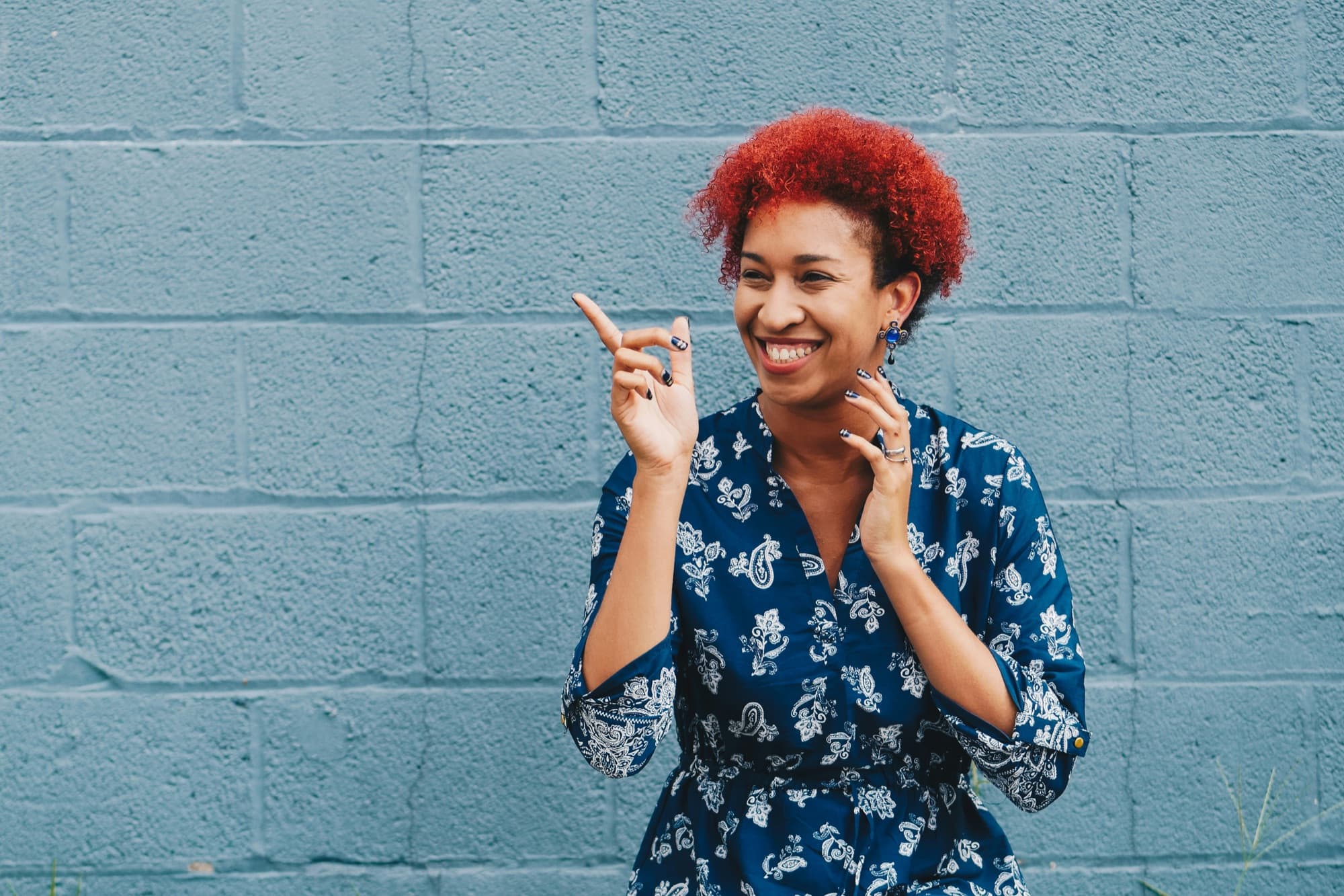 A neurodivergent adult laughing